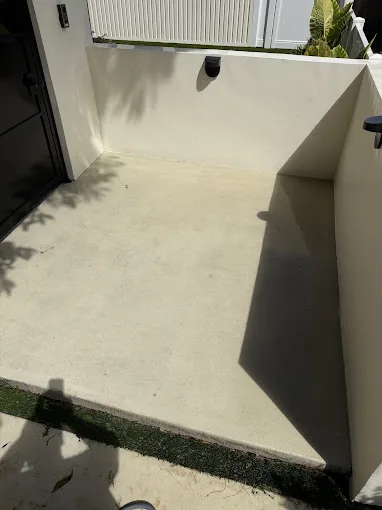 The same concrete entryway after cleaning by Say Wash It